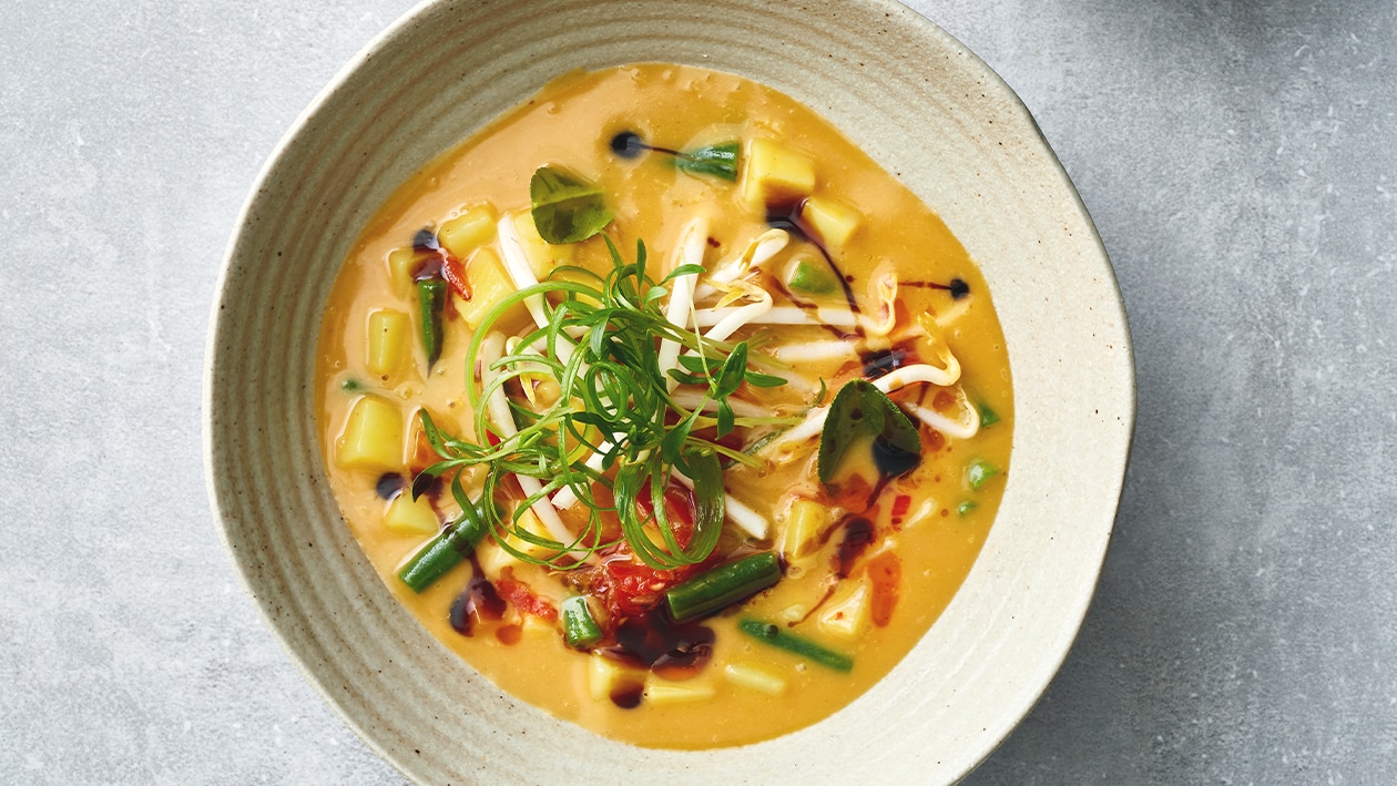 Pindasoep met pompoen en kokosmelk